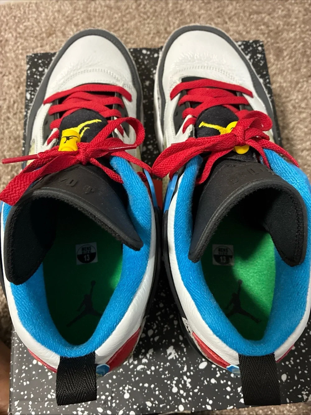 Jordan Men's White Athletic Shoes with Black, Red & Blue Accents